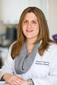 dr. christine lauren in a columbia white coat